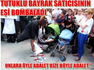 Bayrak satıcısı Ali Sarıçiçek'in  eşi bombaladı