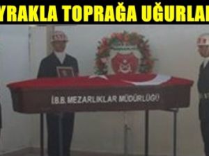 Bayrakla Toprağa Verildi