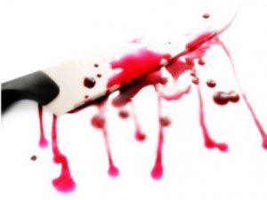 EŞİNİN BOĞAZINI KESTİ