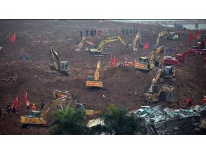 ÇİN'DE 33 BİNA TOPRAK ALTINDA KALDI: 91 KİŞİ KAYIP