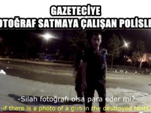 Gazeteciye fotoğraf satmaya çalışan polisler