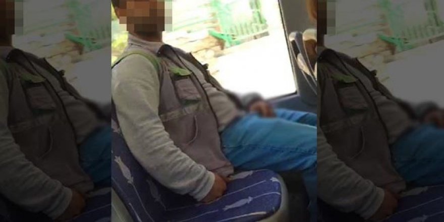 Otobüste kendisine tacizde bulunan kişinin fotoğrafını çekti