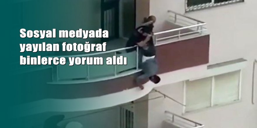 Balkondan sarkarak boya yaptı