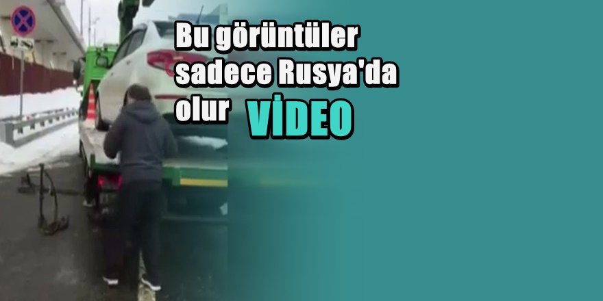 Bir Rus çekiciye yüklenen aracını nasıl kurtarır